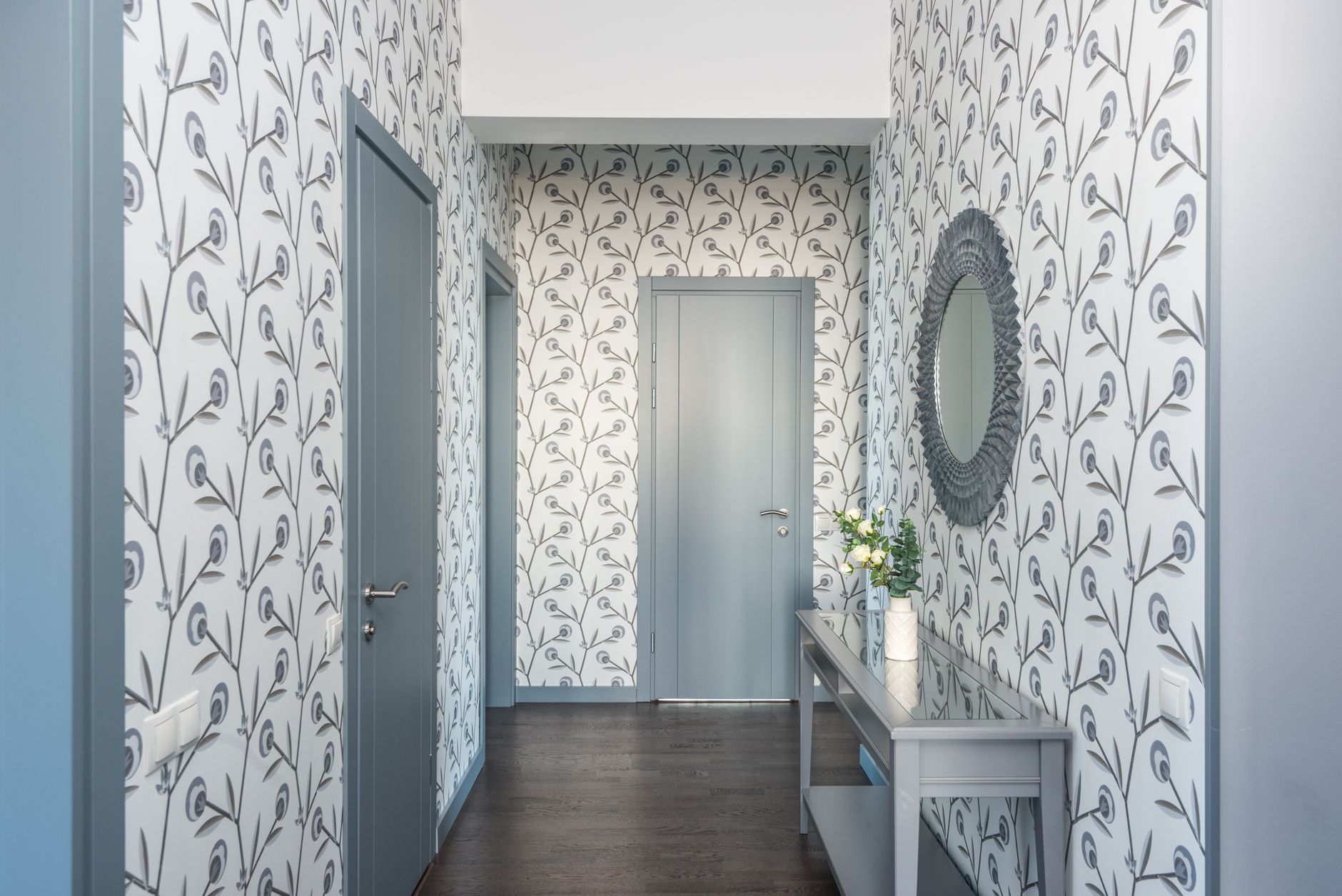 Close-up of peel-and-stick wallpaper application, a popular renter-friendly home décor UK solution
